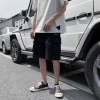 The 2020 summer new casual shorts for men are a trendy brand. The loose straight-leg workwear and five-inch pants are worn outside in a Korean style Application Scenario
